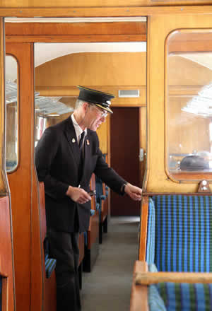 Train inspector checking tickets
